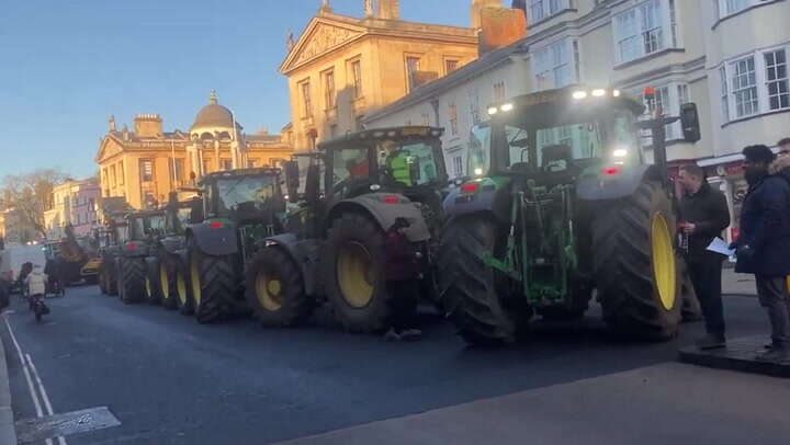 Angry farmers disrupt minister’s speech with loud tractor tax protest