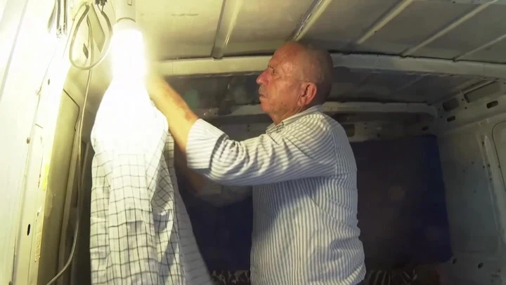 Palestinian forced to live in minibus after refugee camps destroyed