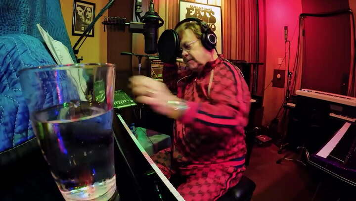 Swearing Elton John smashes headphones in studio tantrum