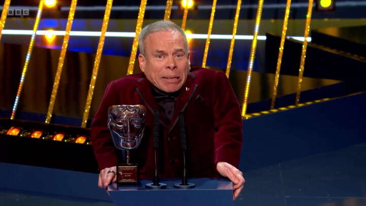 Warwick Davis fights back tears dedicating Bafta award to late wife