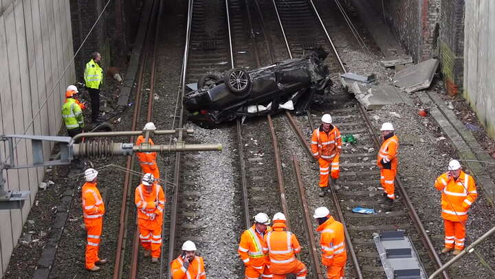 Salford car crash: Video shows cause of long delays to trains in area