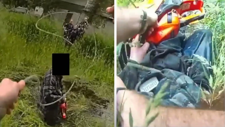 Police lasso chainsaw-wielding man and drag him from pond