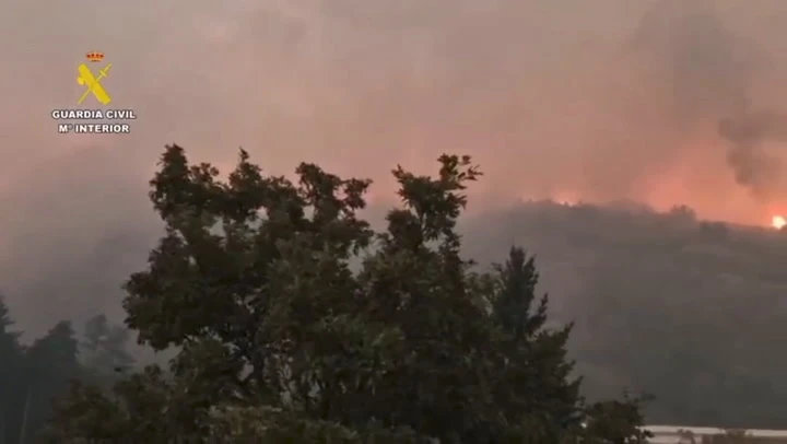 Spanish army use planes to dump water on wildfires savaging country
