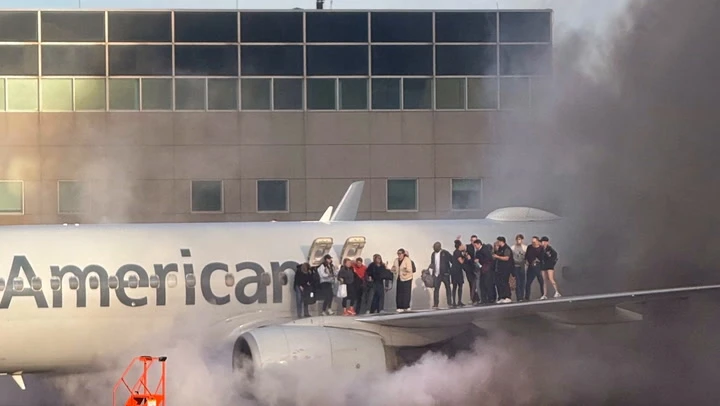 Watch: Plane bursts into flames as passengers escape on wing