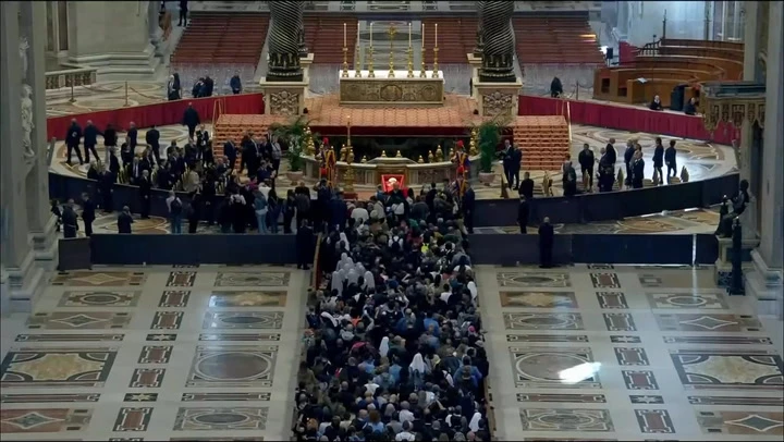 Huge crowds queue to glimpse coffin of Pope Francis at the Vatican