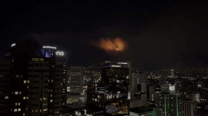 Wildfire breaks out across Table Mountain, covering Cape Town in smoke