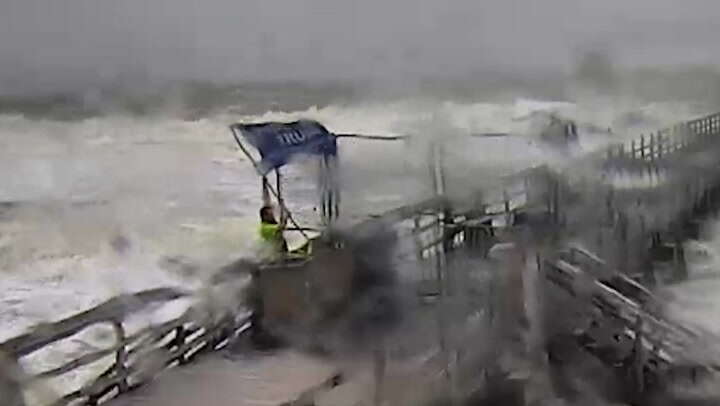 Man plants Trump flag on pier in middle of deadly Hurricane Milton