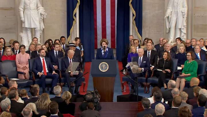 Biden makes sign of the cross during Trump's inauguration ceremony