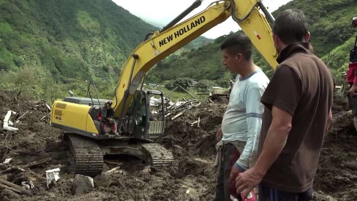 Rescuers remove bodies from hill after fatal landslide Ecuador