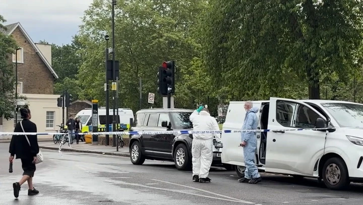 Forensics on scene in Brixton after four people shot from vehicle
