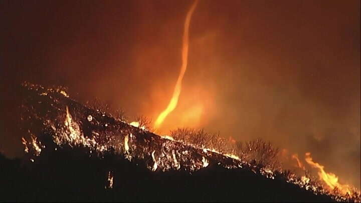 Fire tornado forms as wind whips up flames in California wildfires