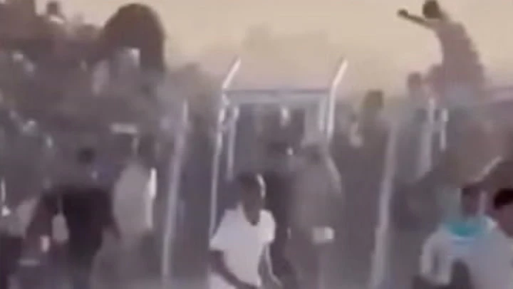 ‘Apocalyptic’ video shows hundreds of Palestinians rushing to aid site