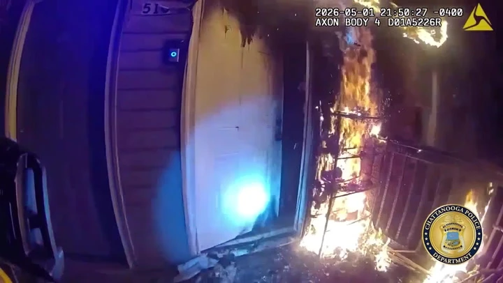Mother and children in burning building saved in dramatic rescue