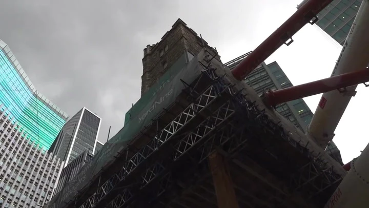 Medieval London church lifted into sky as office is built underneath