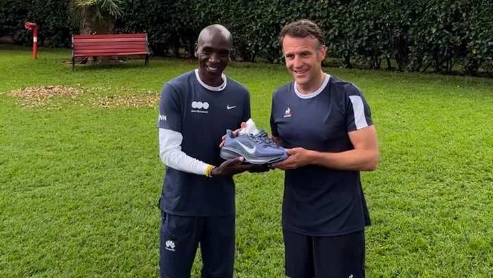 Watch: Macron joins Olympic marathon champion for morning run