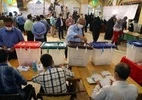 Iranianos vão às urnas para escolher novo presidente
