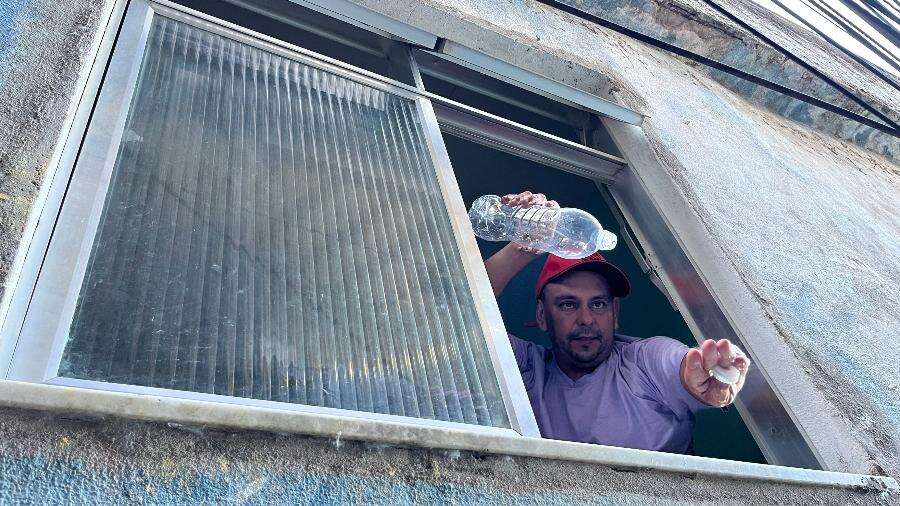 'De dia falta água, de noite falta luz': o calor carioca na favela