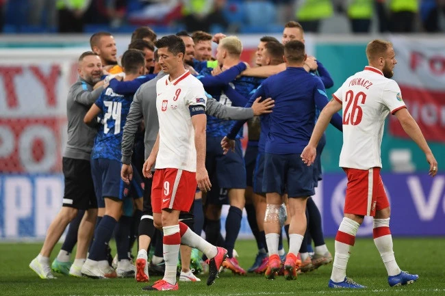 Slovakia beat 10-man Poland to open Euro 2020 account