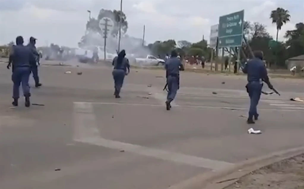 WATCH | Several injured as police fire rubber bullets at North West farm protesters 