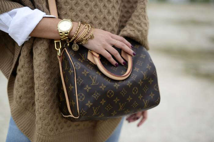 Belê jy in ’n handsak of eerder ’n aandeel in Louis Vuitton?