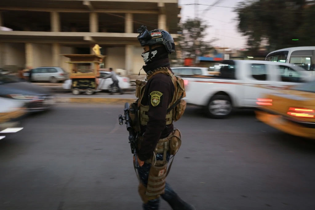 Iraqi police questioned after 21 prisoners escape jail