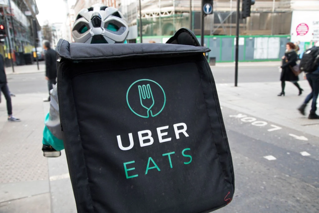 Pandemic keeps Uber in the red as revenue plunges