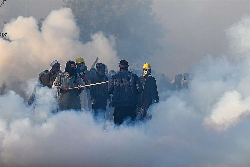 SEE | Pakistan police fire tear gas, rubber bullets at ex-PM Imran Khan supporters