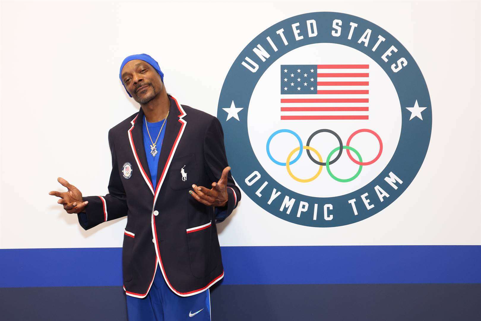 Rapper Snoop Dogg dra ook die Olimpiese vlam