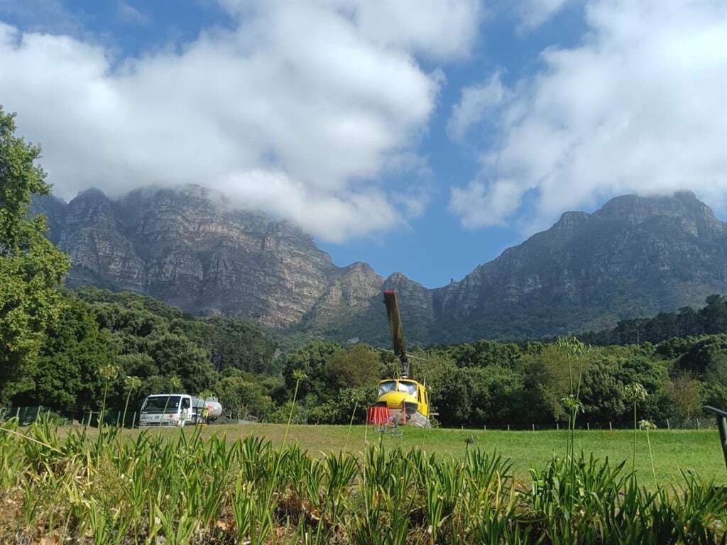 Blaze contained on Table Mountain, some trails reopen as firefighting efforts continue