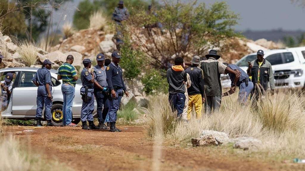 Decomposed body of illegal miner brought to surface by Stilfontein locals