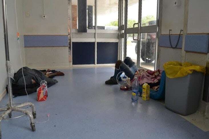 Patients lie on the floor at Uitenhage hospital - some with serious injuries