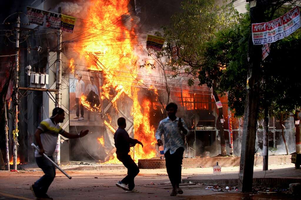 At least 91 killed as clashes rock Bangladesh, curfew imposed