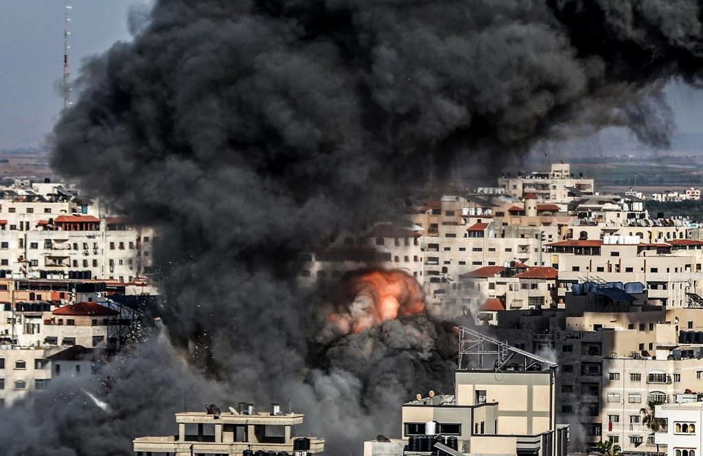 Israel pounds Gaza to curb Palestinian militants but rockets still fly in day 5 of the conflict