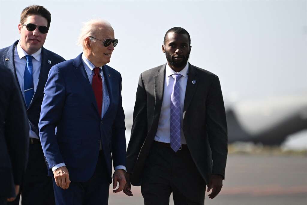 Biden lands in Angola, on a trip overshadowed by his pardoning of son Hunter