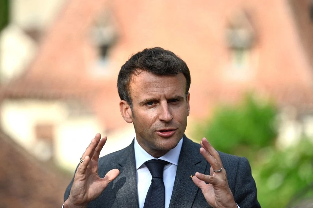 France's Macron offers UK's Johnson a 'reset' if he keeps his word on Brexit divorce deal