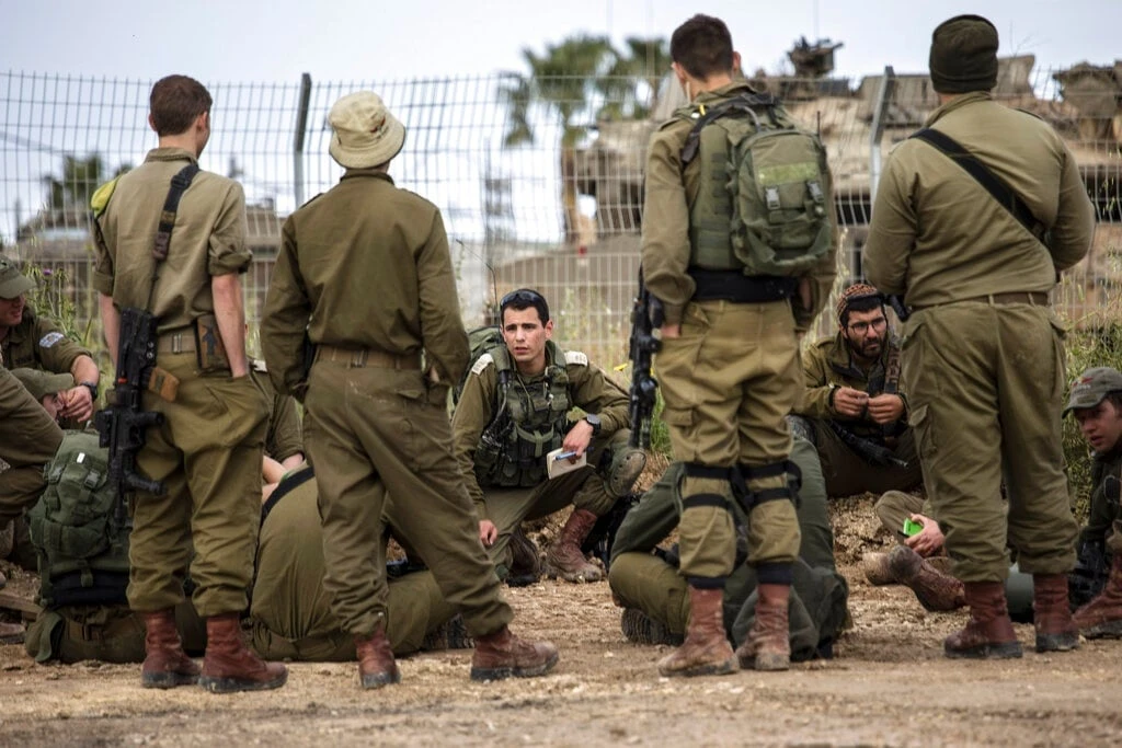 Israel police kill two gunmen after attack on West Bank base