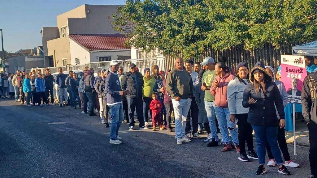 Overcoming queues, a protest and a shooting, Cape Town voters head to polls to make their mark