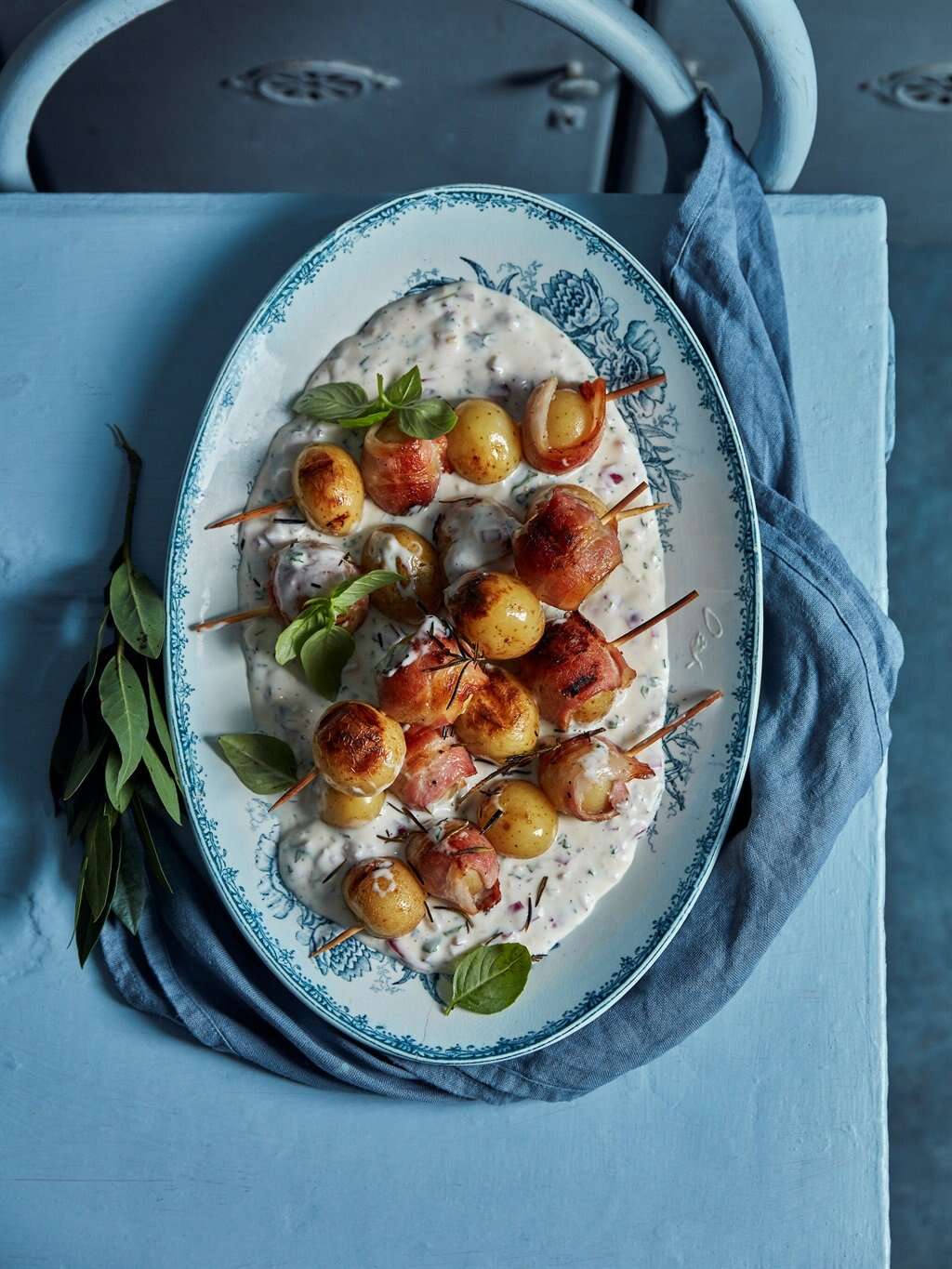 Bacon-wrapped potato salad skewers