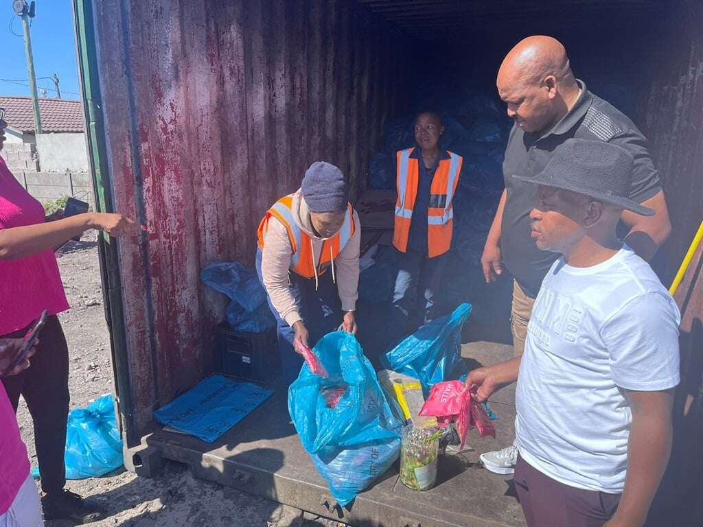 WATCH | Expired food allegedly dumped by spaza shops endangers Khayelitsha children