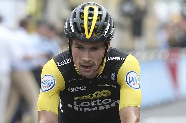 Roglic wins Vuelta stage eight and cuts gap behind Carapaz