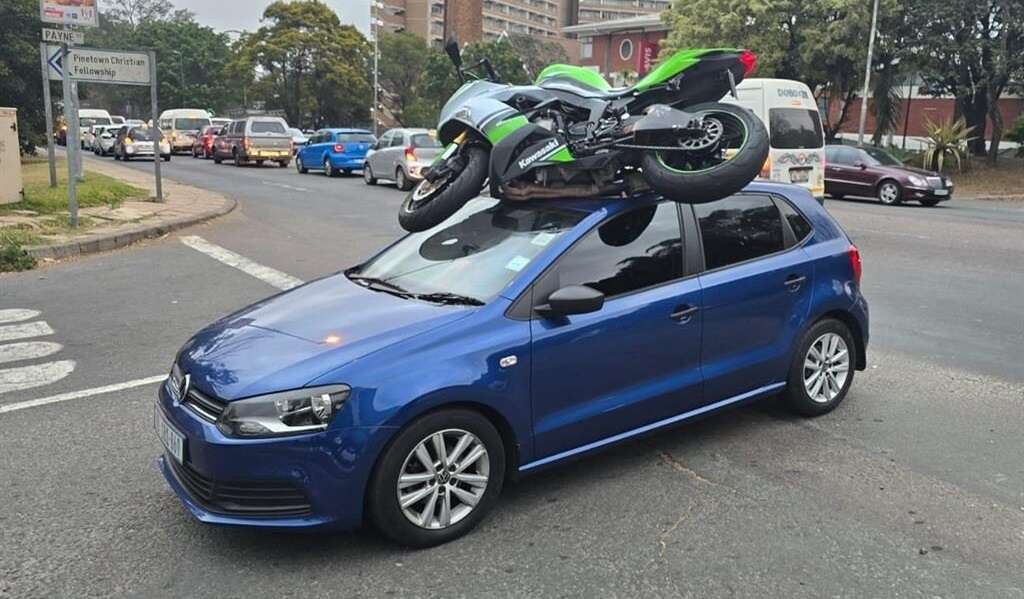 Man injured after his superbike lands on top of car in Pinetown crash