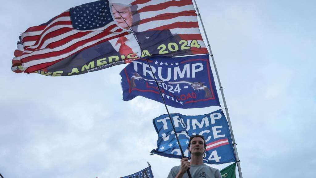 'Anything can happen': Nerves and prayers from Trump supporters at election watch party