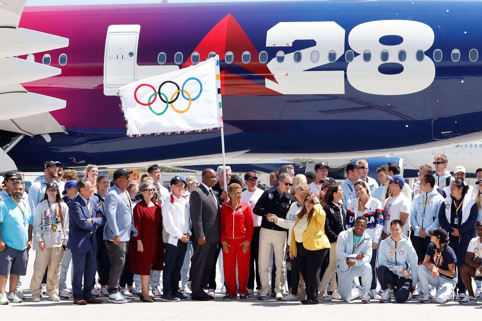 Olimpiese vlag land in Los Angeles, nou begin die harde werk