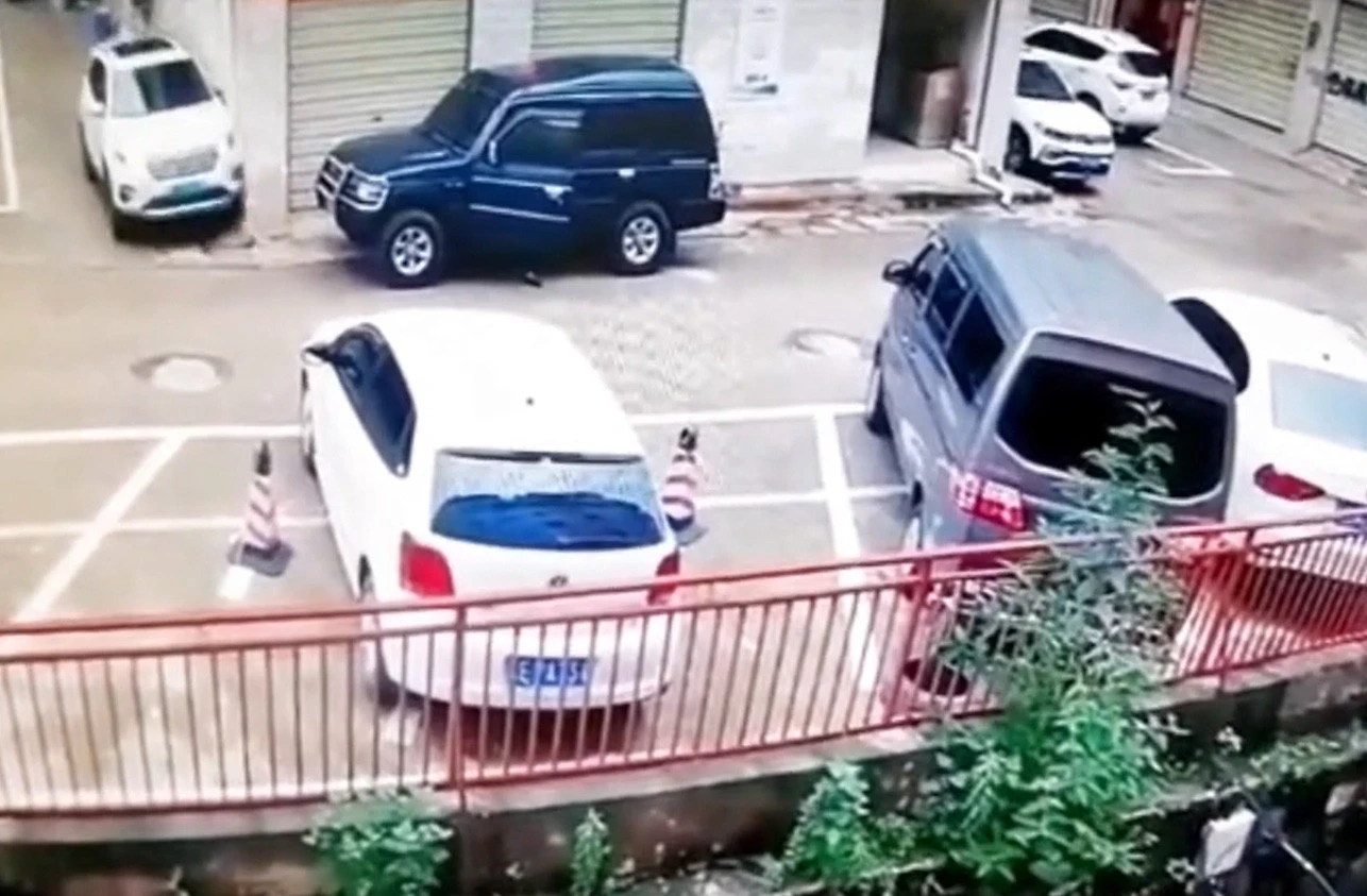 Cars fall from raised road after collision