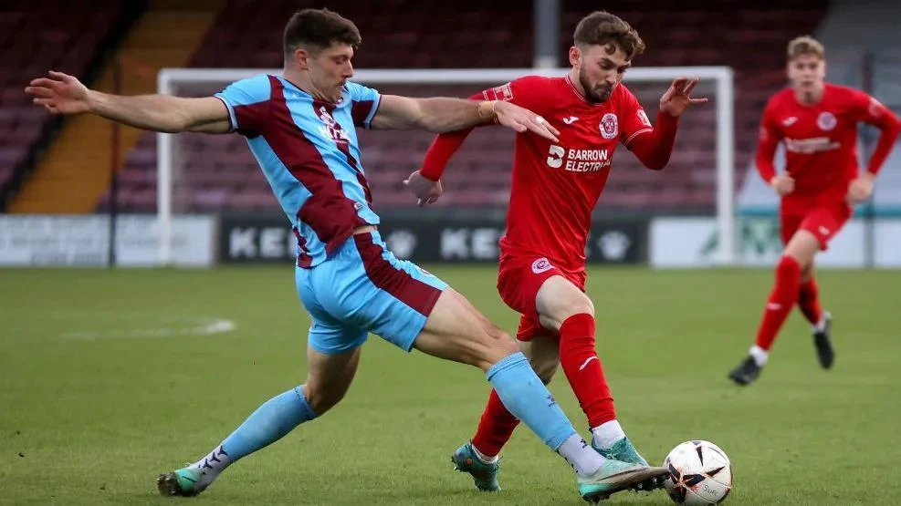 Evans agrees new Scunthorpe deal