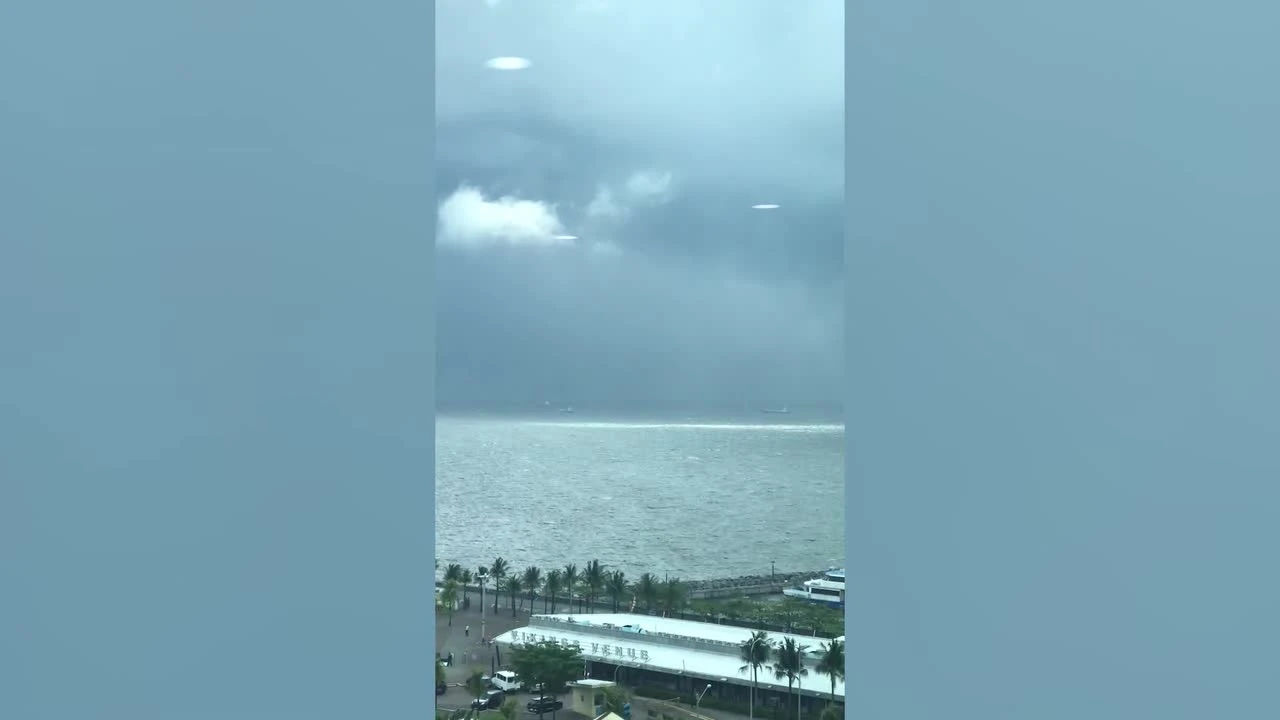 Bizarre glowing discs appear in the sky before storm