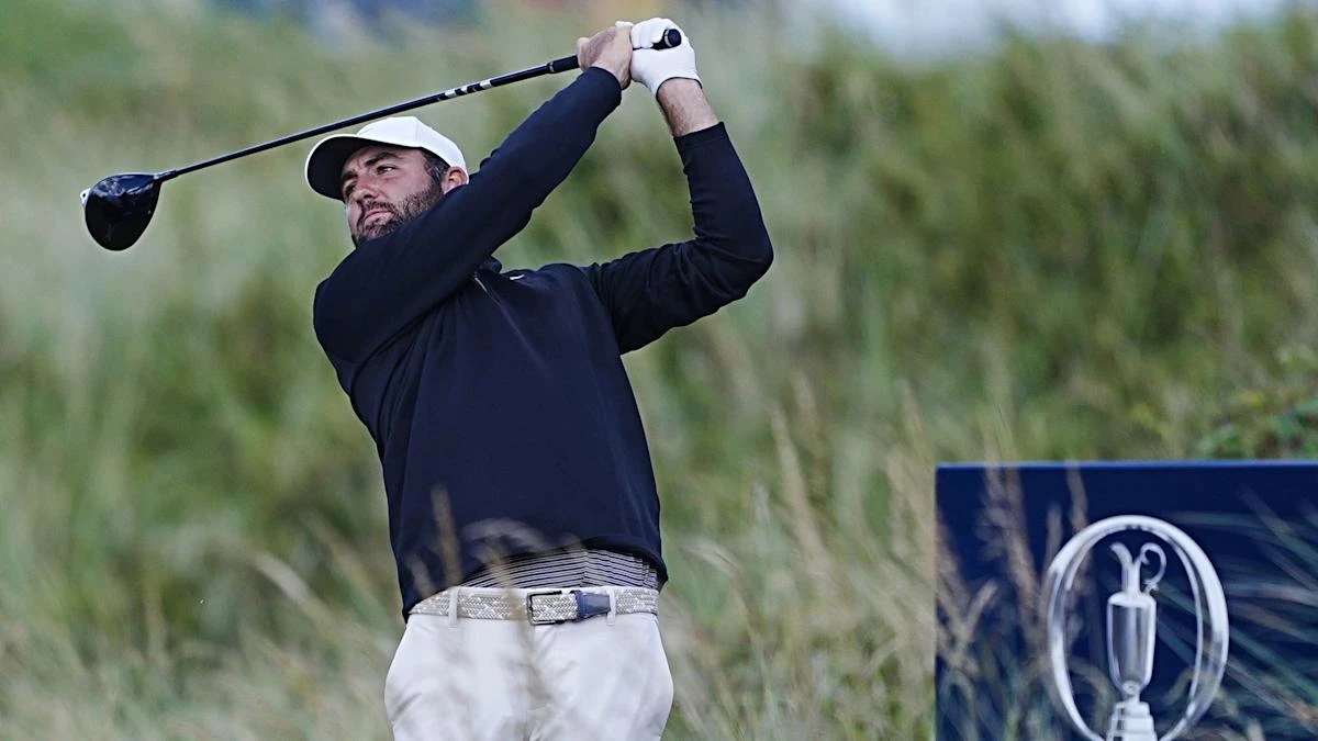 Scottie Scheffler takes grip of Open as Rory McIlroy charges up leaderboard