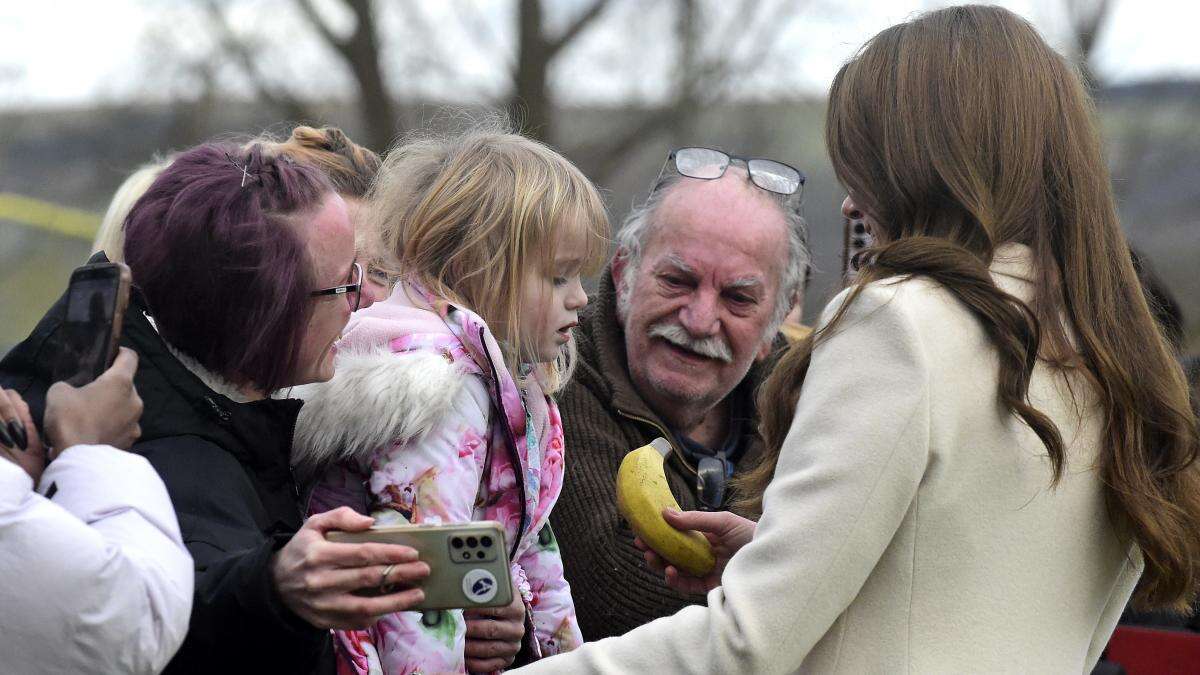 Kate takes time out to greet young fan on factory visit