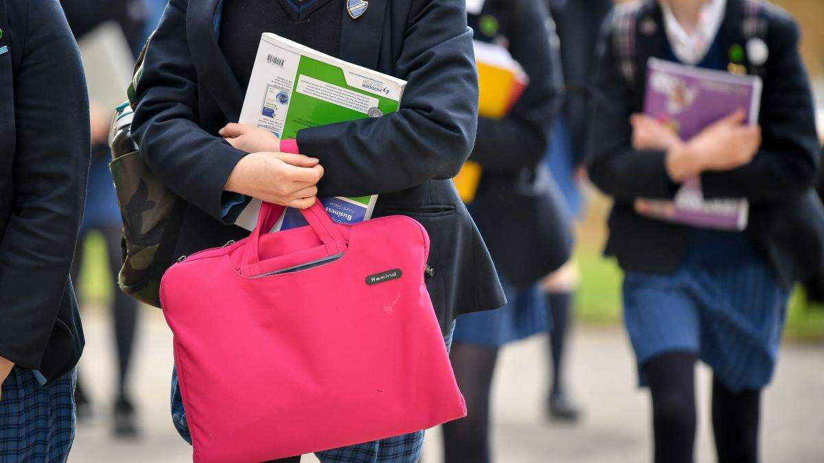 Fewer pupils out of school at start of academic year as absence fines rise