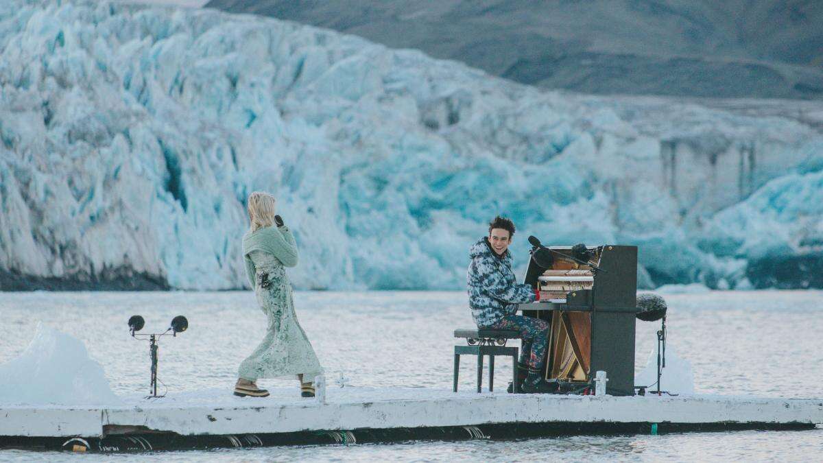 British singer performs duet amid Arctic icebergs in call for climate protection